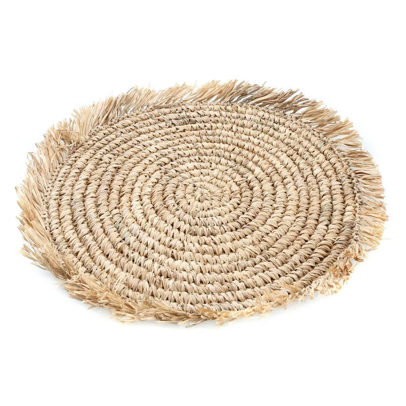 Set de table rond en raphia naturel avec franges pour une décoration chaleureuse
