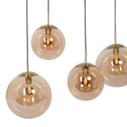 Suspension linéaire multiple en verre ambré et laiton 6 lampes décalés – 120x25 cm