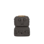 Porte-bougie totem en grès noir sculpté avec motifs géométriques