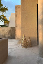 Suspension en rotin naturel forme bouteille ondulée – H55 cm