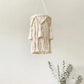 abat-jour nordique en macramé avec tressage artisanal et décoration en coton.