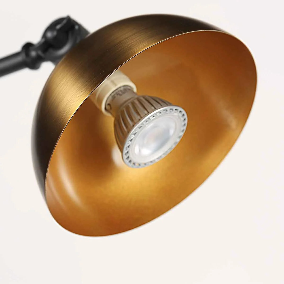 Applique murale en métal noir et bronze avec lampes LED dorées à bras articulé