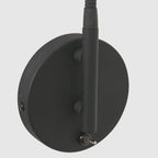 Applique murale noire en métal avec bras orientable et interrupteur intégré