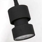 Lampadaire noir en métal avec bras orientable et interrupteur intégré