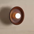 Vue latérale de l'applique murale ronde en bois