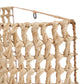 Coin inférieur d’un panier en paille tressée naturel dans l’Applique murale en sisal