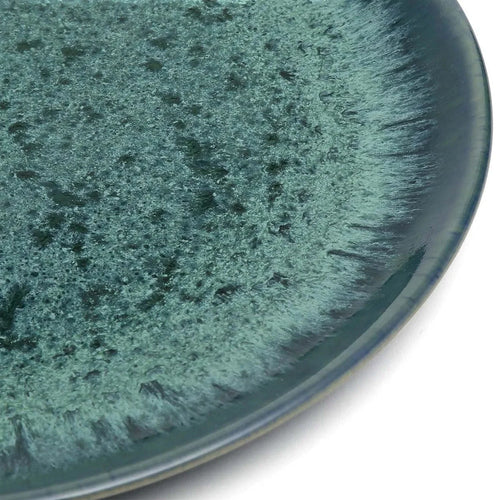 Assiette en grès émaillé vert aqua moucheté effet halo texturée