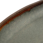 Assiette de service ovale en grès émaillé gris et brun rouille