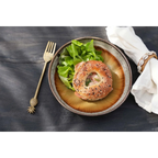Bagel aux graines de sésame et pavot, garni de légumes verts et de pâte rose