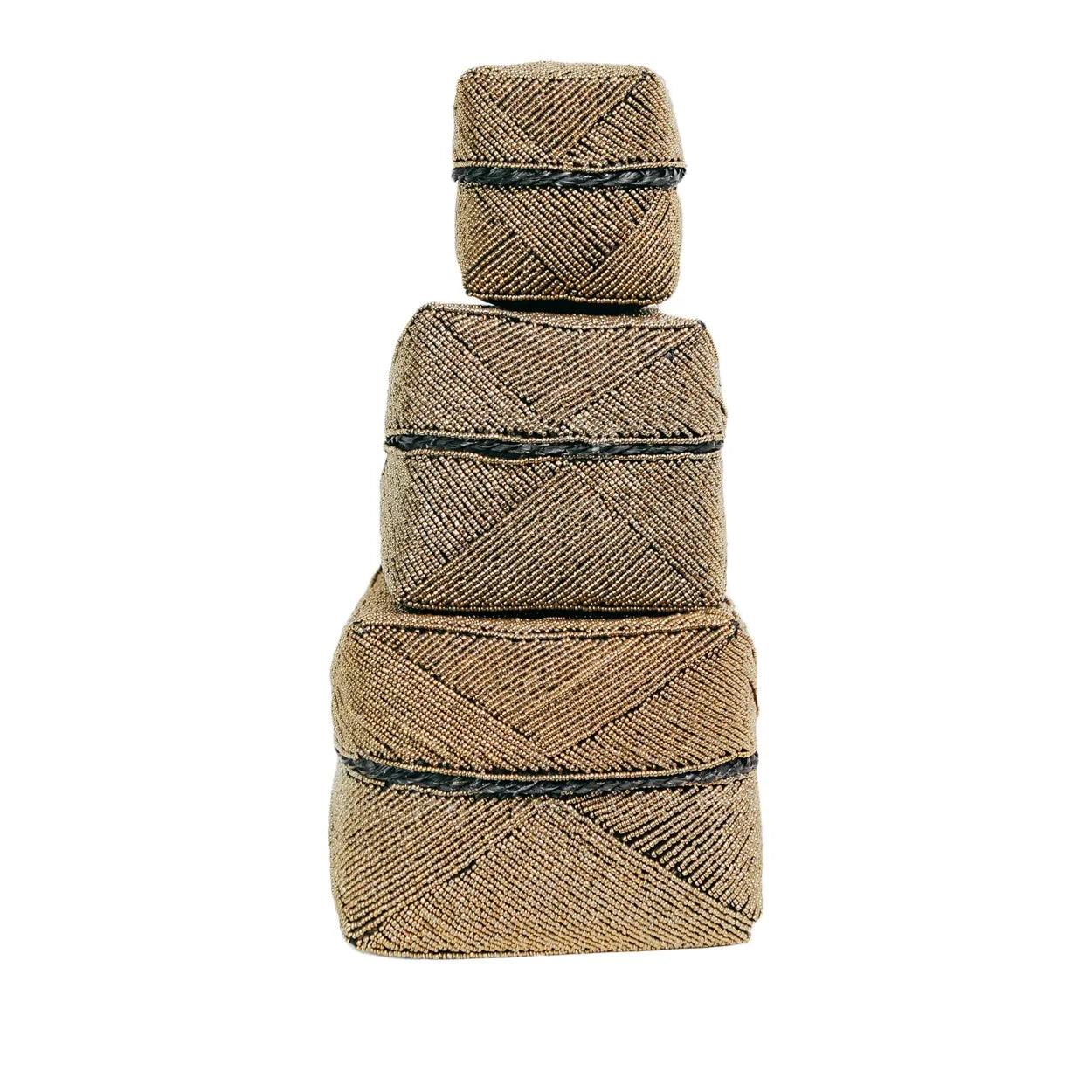 Stacked woven storage boxes in gold beads with geometric pattern for elegant organization