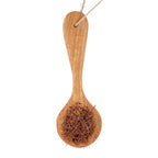Brosse de nettoyage en bois naturel et fibres de coco brunes denses