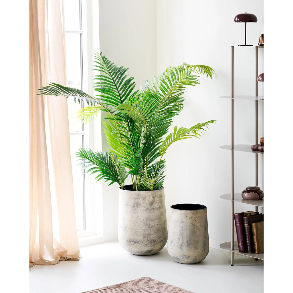 Cache-pot en métal effet béton beige grisé avec frondes de palmier
