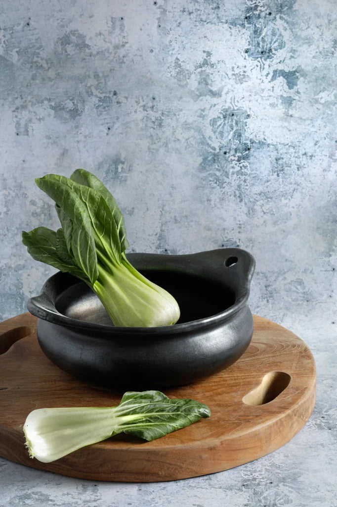 Bok choy frais dans le produit La Casserole Brûlée Noire
