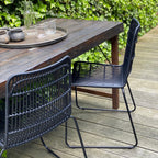 Lot de 2 chaises de jardin noires en métal et rotin synthétique tressé