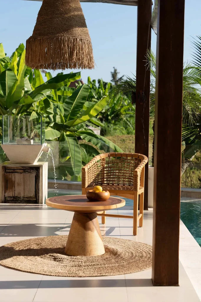 Canapé et fauteuils en tressage pour extérieur dans la salle à manger Tugu Extérieur