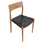 Chaise en teck avec assise tressée en cuir noir pour salle à manger