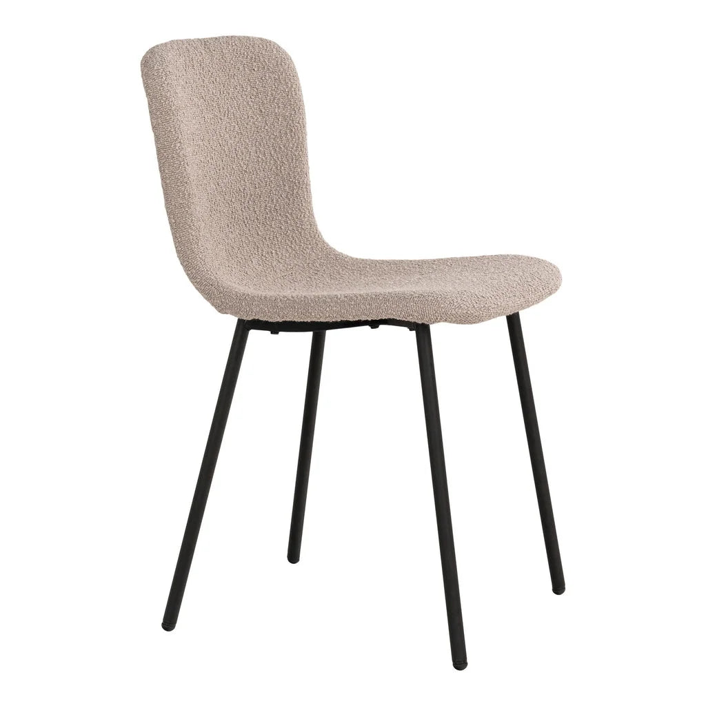 Chaise en tissu bouclé beige avec pieds noirs et structure rembourrée élégante