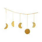 Déco murale lune en métal doré