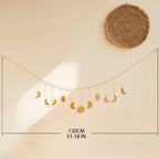 Déco murale lune en métal doré information