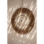 Décoration murale ronde en raphia et macramé coton blanc pour intérieur chic