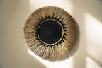 Décoration murale ronde en raphia et macramé noir de 60 cm