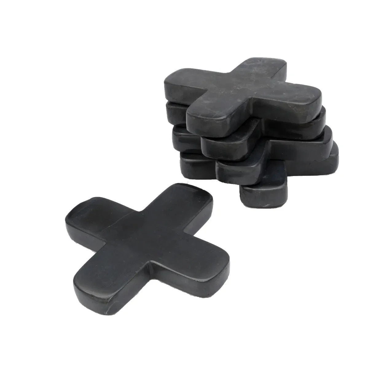 Pile d objets en forme de croix en marbre noir design minimaliste