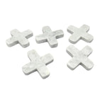 Dessous de plat en marbre blanc avec cinq croix minimalistes élégantes