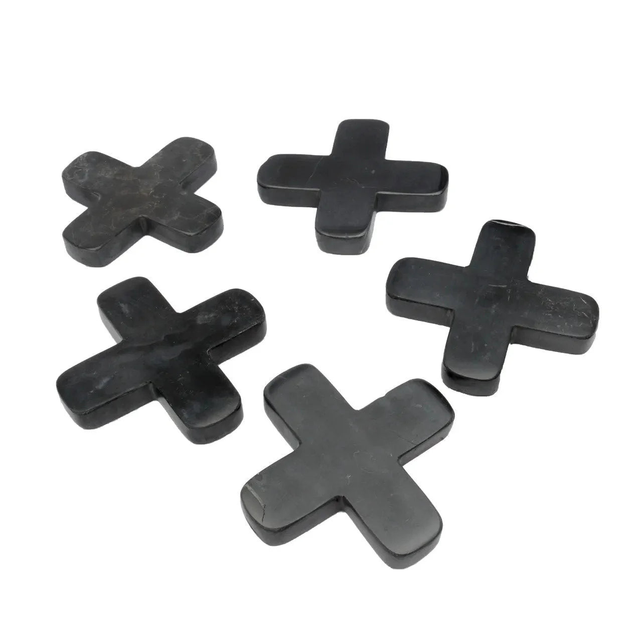 Cinq croisillons en plastique gris foncé pour pose de carreaux en marbre noir minimaliste