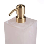 Distributeur de savon en résine marbrée rose et blanche avec pompe dorée