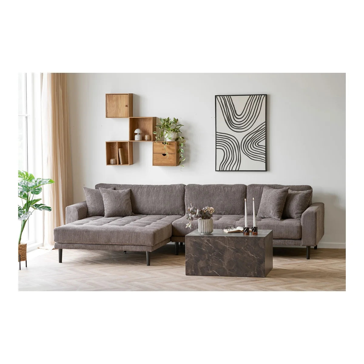 Canapé sectionnel en velours gris avec chaise longue et coussins décoratifs