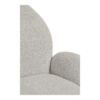Fauteuil bouclé gris clair pivotant avec accoudoirs enveloppants texturés