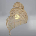 Design en bambou naturel du grand lustre bambou, parfait pour une décoration organique.