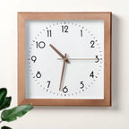 Horloge murale carrée en bois foncé
