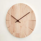 Horloge murale ronde en bois vue de profil