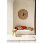 Miroir en rotin aux bords frangés et tons bruns naturels