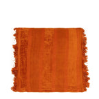 Coussin carré en velours rouille avec rayures orange et franges de 60x60 cm