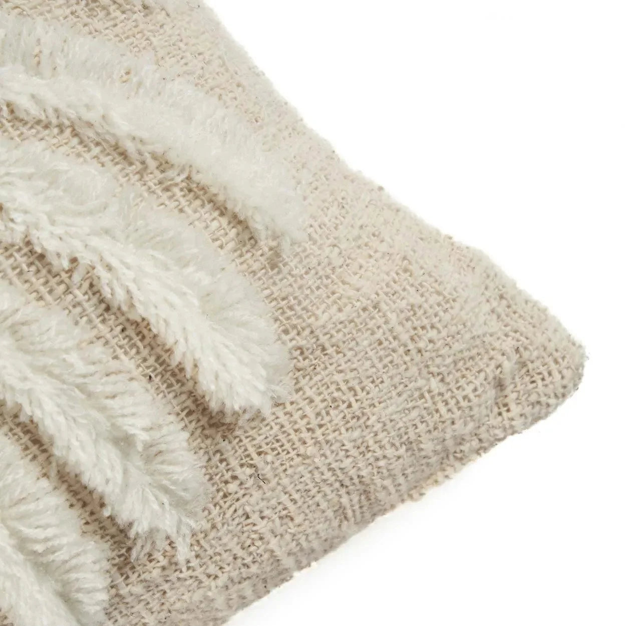 Coussin en coton blanc naturel avec motif palmier stylisé, texture tissée et franges décoratives