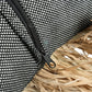 Coussin en coton et raphia noir naturel 30x50 avec housse à motif carreaux noir et blanc avec fermeture éclair