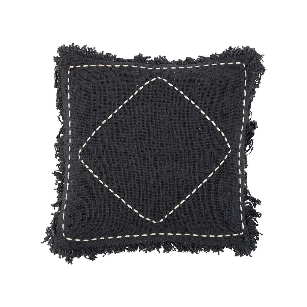 Coussin noir à franges avec motif losange blanc de la collection Kasbah