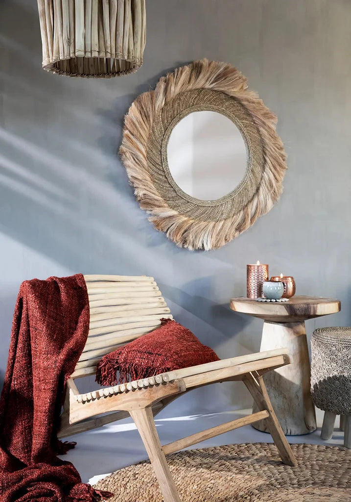 Miroir de style bohème avec bordure en fibres naturelles et franges