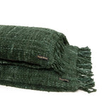 Couvre de coussin vert forêt en tissage avec franges pour la décoration intérieure