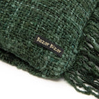Écharpe tressée verte avec franges, accessoire tendance et élégant
