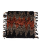 Housse de coussin rectangulaire en coton noir et orange à motifs géométriques avec franges