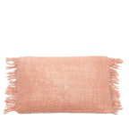 Coussin rectangulaire rose saumon texturé avec franges 30x50 cm