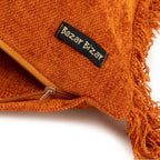 Tabouret tressé fibres naturelles pieds bois tons terreux velours rouille 35x100 cm