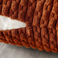 Gros plan de la housse de coussin terracotta