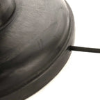 Lampe de sol en bois noir avec abat-jour en raphia naturel et objet circulaire métallique