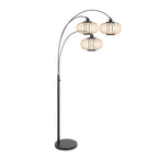 Lampadaire en métal noir à trois bras courbés avec abat-jours ajourés sphériques