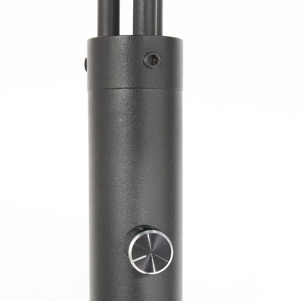 Base cylindrique noire en métal brossé avec bouton argenté circulaire