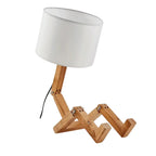 Lampe de chevet bonhomme en bois fond blanc